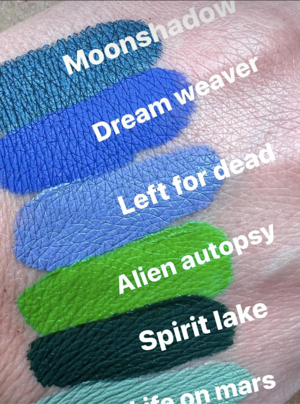 liquidlipalienautopsy swatch with other colours on back of hand